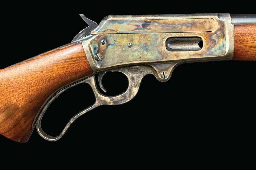 Exceptional surviving case colors highlight this prewar .30-30 Winchester lever-action rifle, featuring a 24-inch round barrel and classic walnut furniture.
